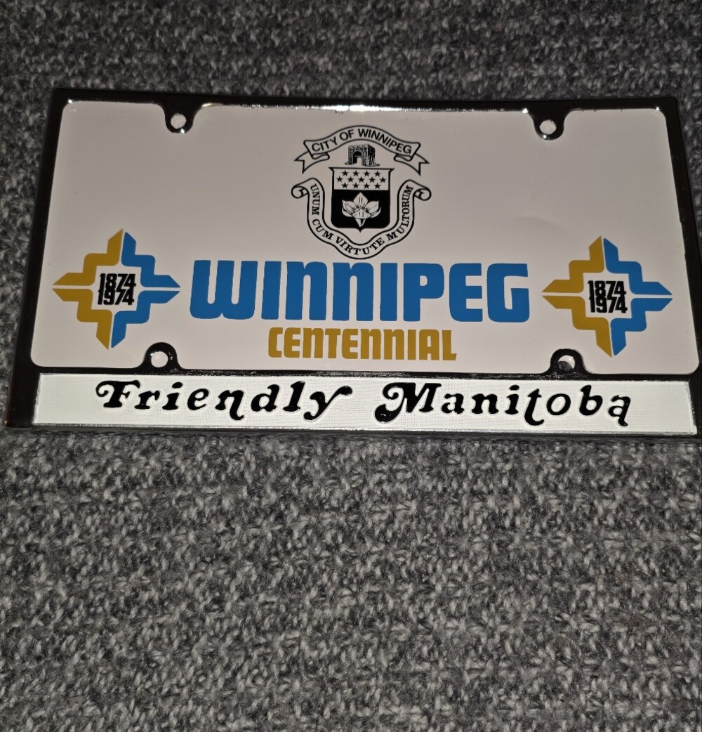 Vintage 1974 Winnipeg Centennial Car license plate.